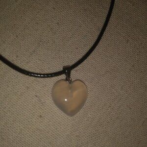 White translucent heart shaped stone pendant necklace.
